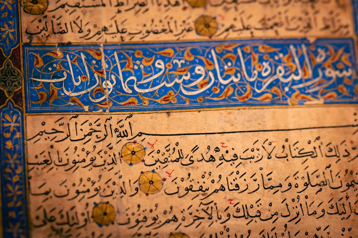 Handwritten manuscript with ancient script letters on parchment